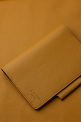 Porta libreta Mostaza